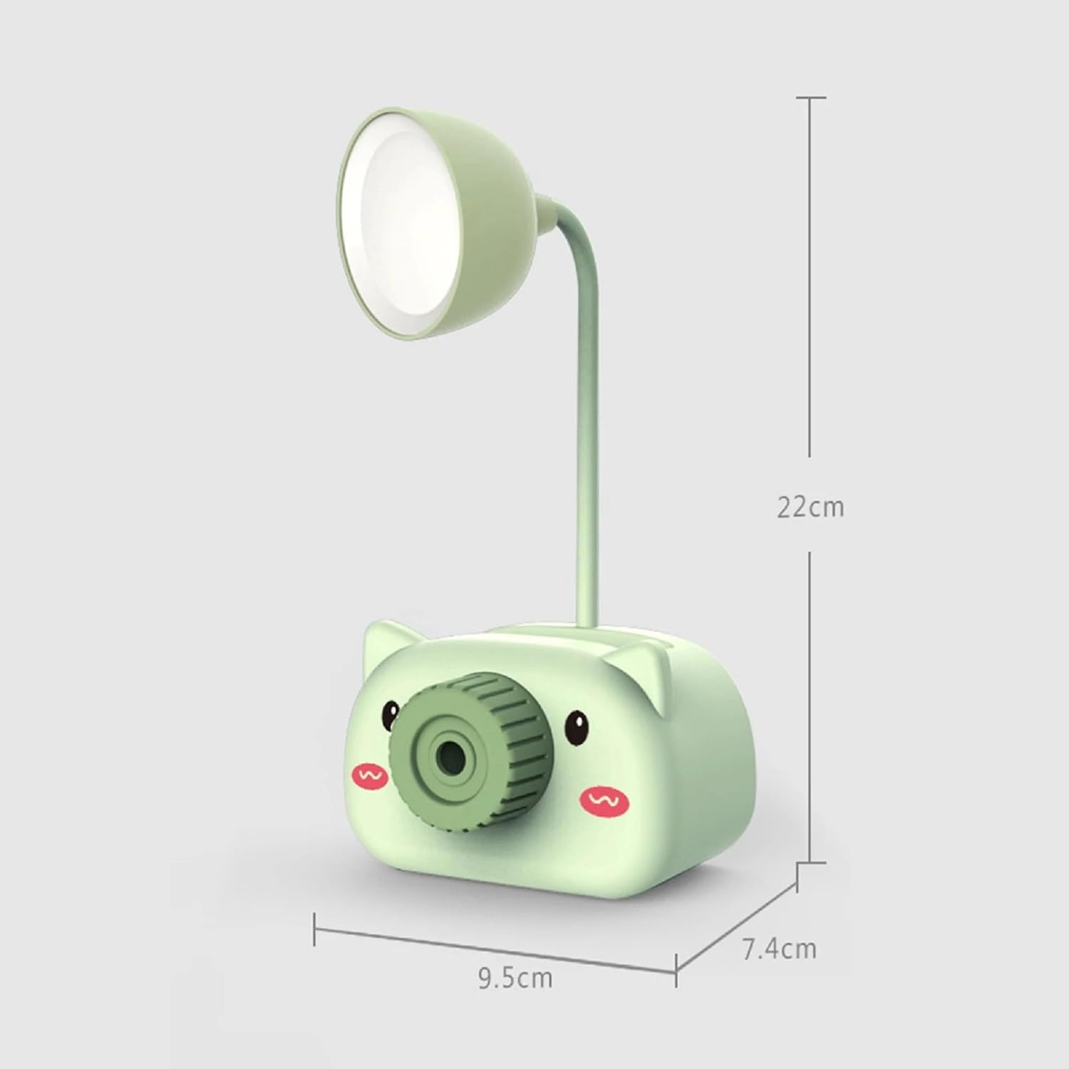 Green camera-shaped lamp with dimensions on a light gray background