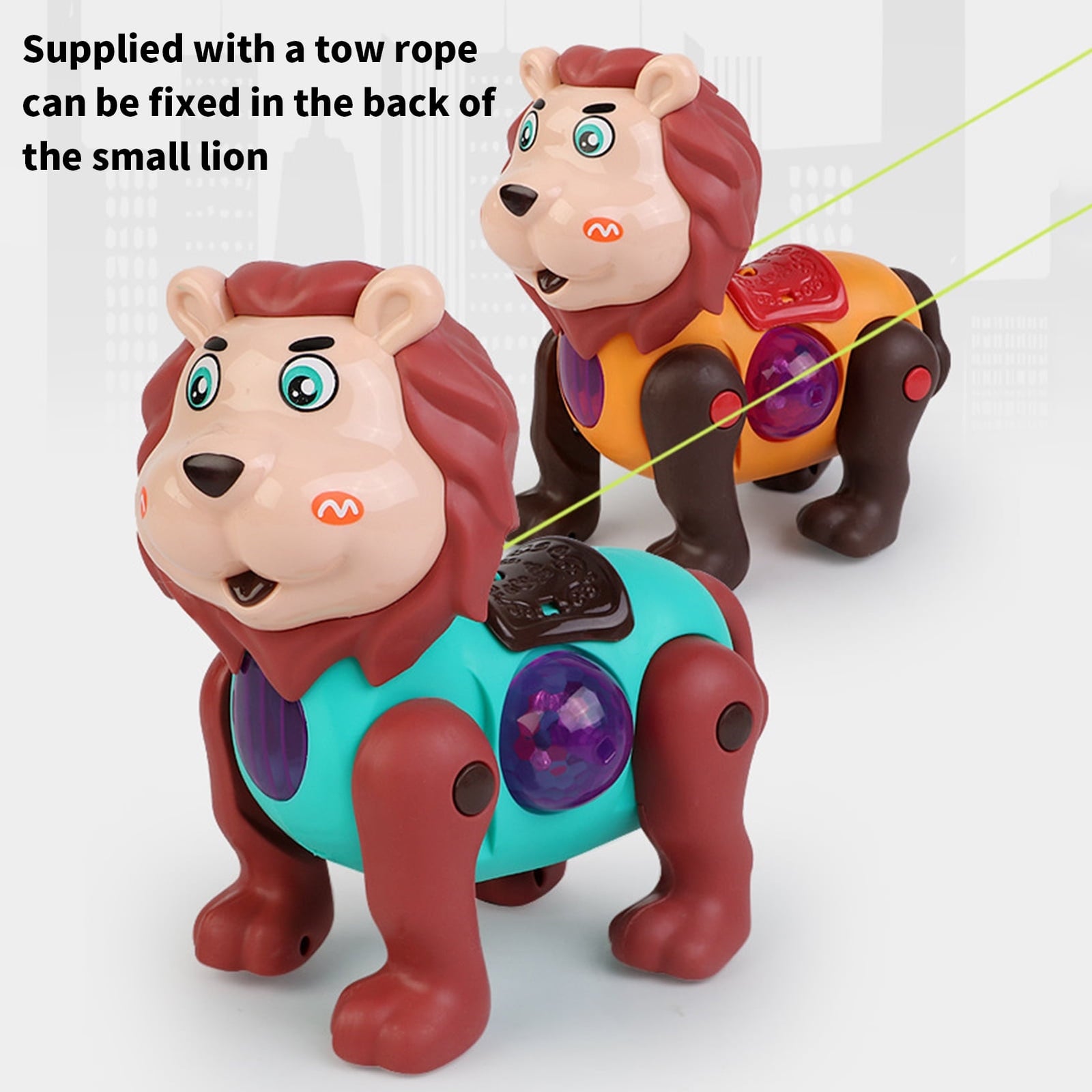 Two toy lions with a tow rope attached on a white background
