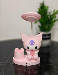 Pink cartoon character with a heart on a stand against a neutral background
