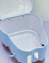 Blue pet carrier with open lid on a light purple surface
